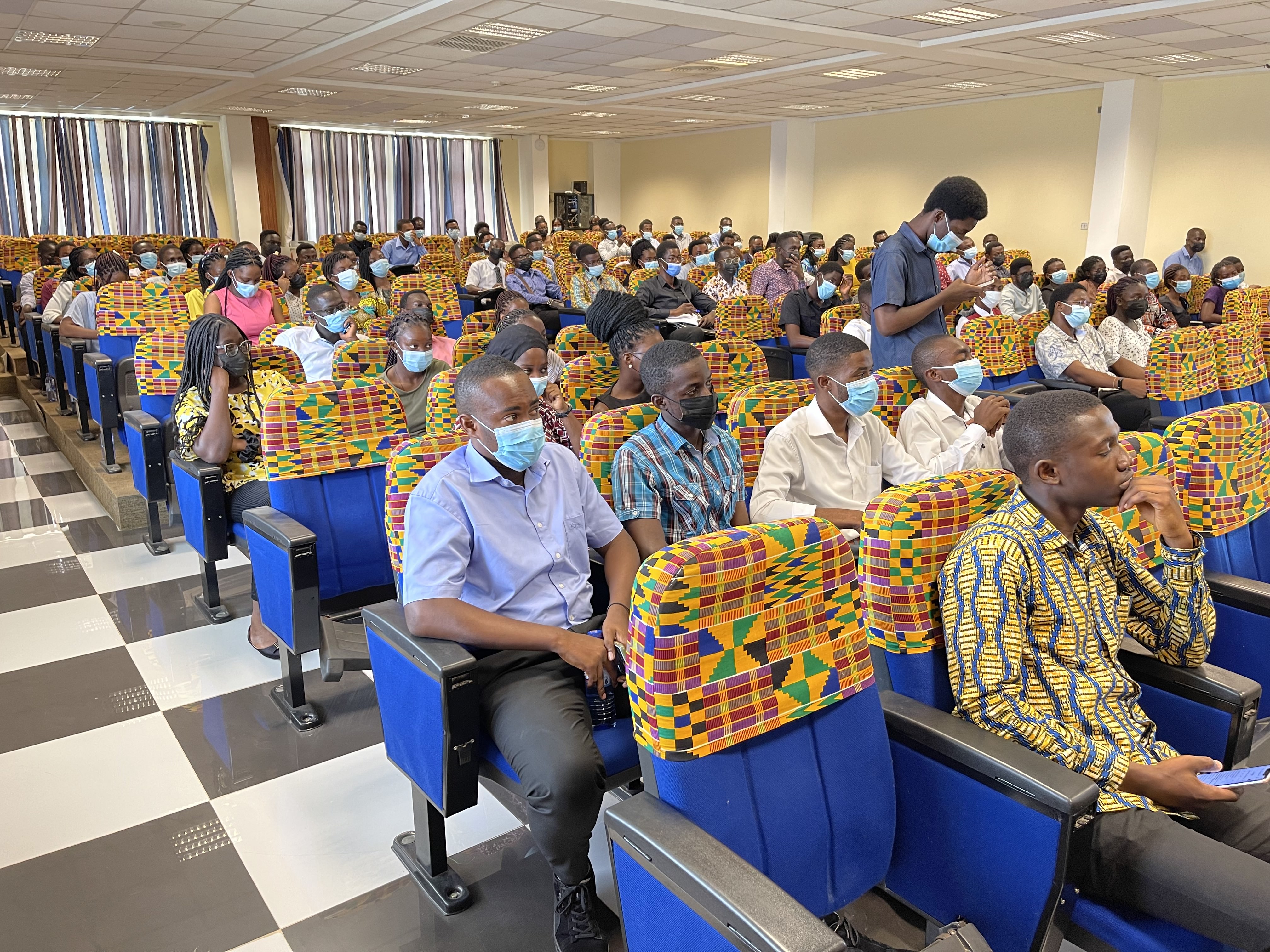 Freshers listening to advice from the Dean