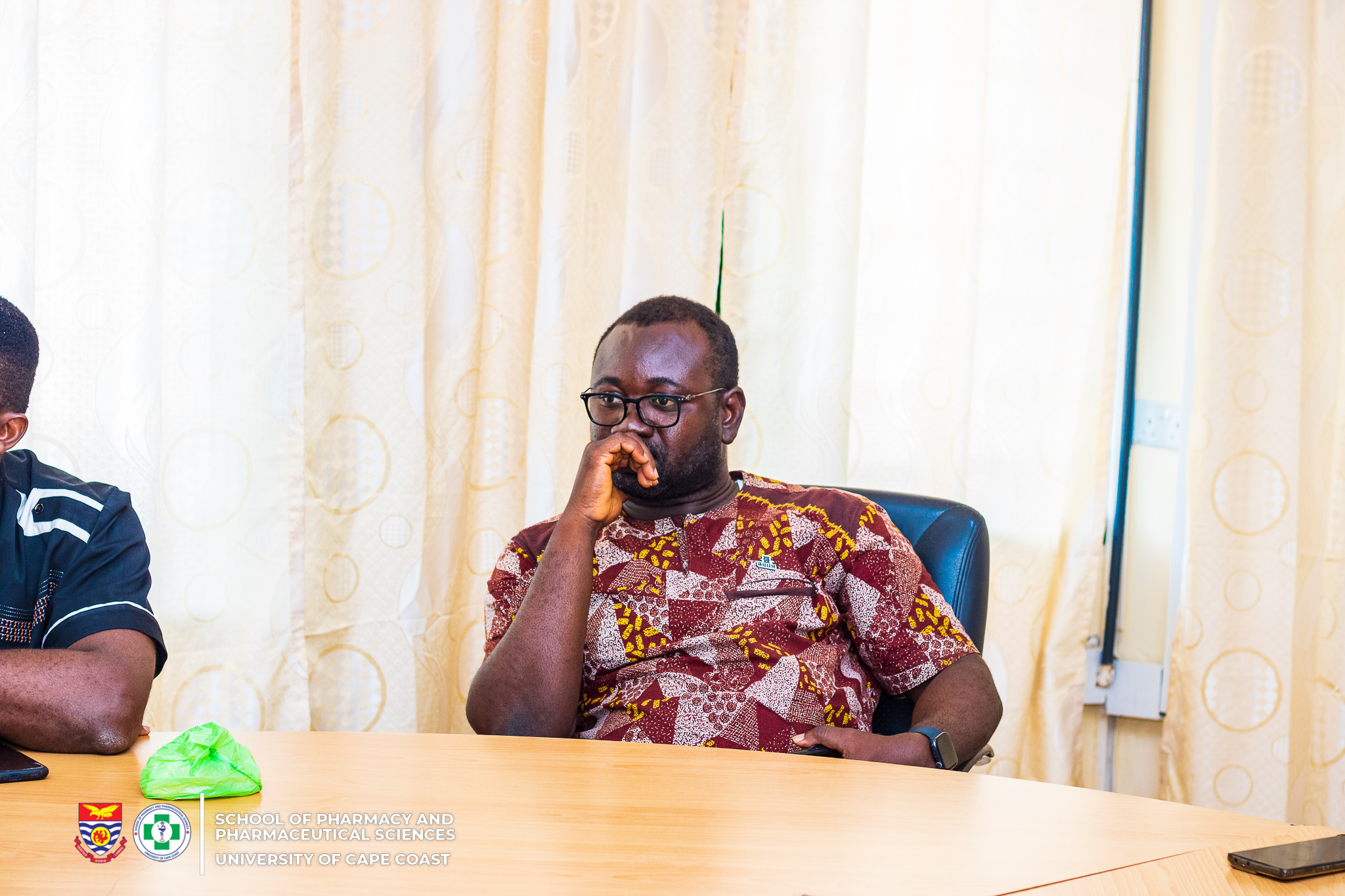 Dr Ernest Obese (Vice Dean) listening to Professor Jon Wietholter