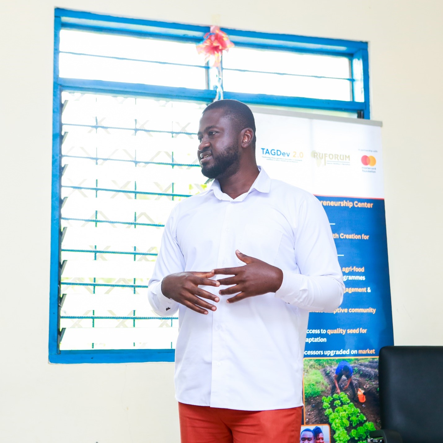 Associate Programme Officer, Dr. Zikiru Shaibu, presenting at the function