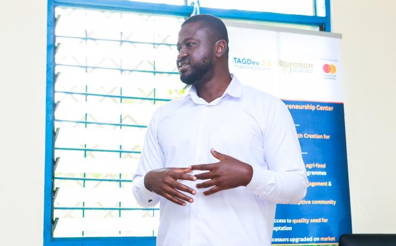 Associate Programme Officer, Dr. Zikiru Shaibu, presenting at the function